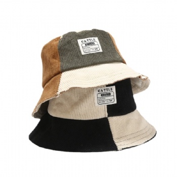 Corduroy bucket hat with custom logo.